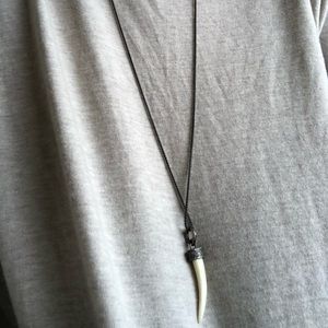 black necklace with pave diamond horn charm